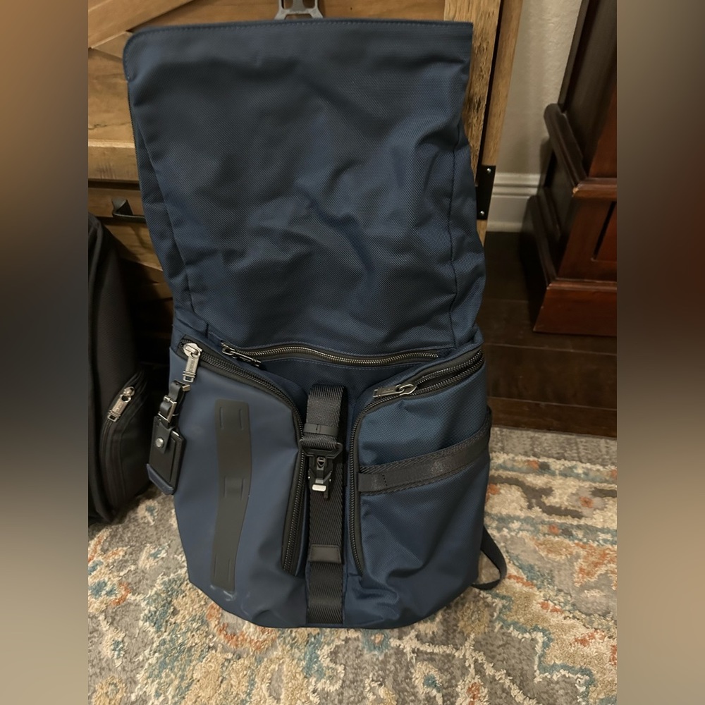 Navy Blue Tumi backpack. Only used twice. Excellent condition. . $350